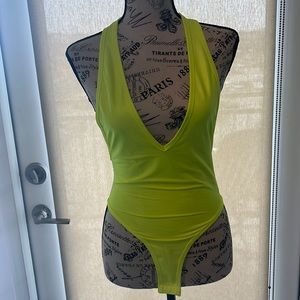 Neon yellow bodysuit.